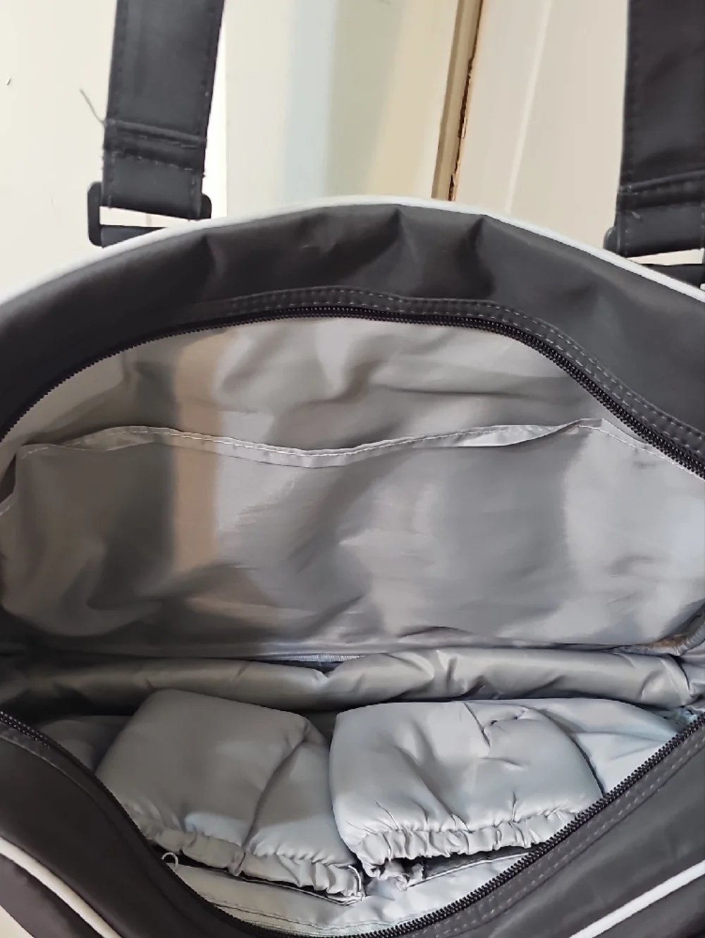 Eddie Bauer Black Quilted Baby Bag with White Piping